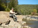 Angler on Rocks