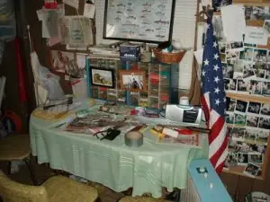 Kitchen table is for fishing stuff; fish pictures, and memories of fishing buddies.. you eat outside on the porch…