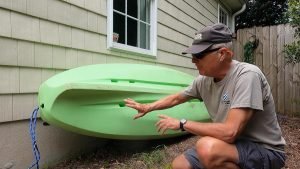 Inspecting a used kayak